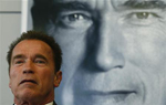 Schwarzenegger flexes muscles again