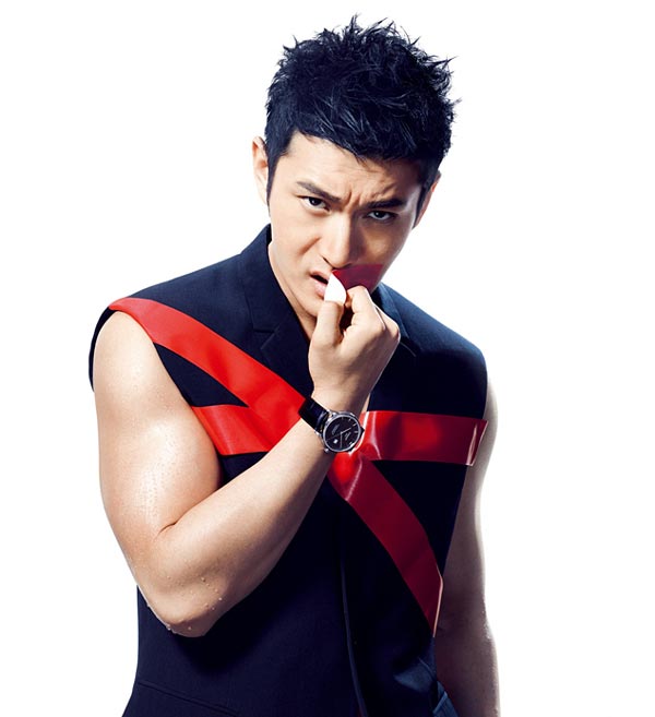Huang Xiaoming poses for fashion magazine
