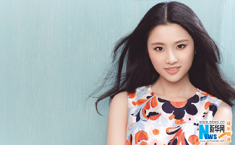Actress Zhang Huiwen poses for U+ magazine
