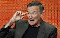 Comedy great Robin Williams hanged himself at home