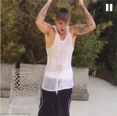 Justin Bieber takes on Ice Bucket Challenge