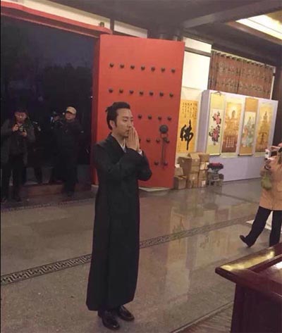 Singer Li Yugang converts to Buddhism