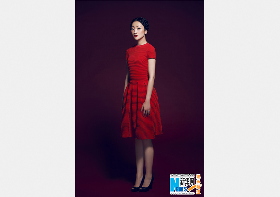 Actress Zhang Yao poses for photos