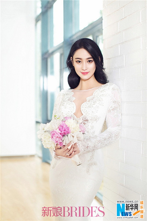 Elegant Zhang Xinyu poses for BRIDES magazine