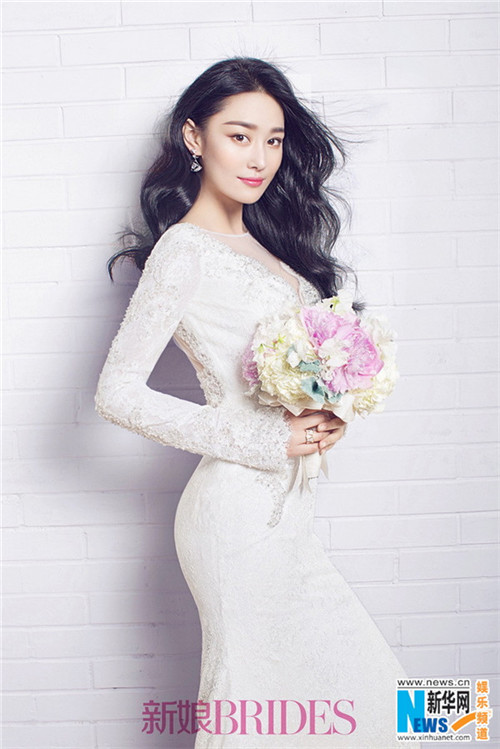 Elegant Zhang Xinyu poses for BRIDES magazine