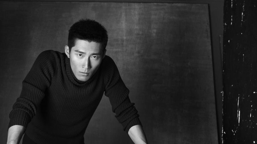 Actor Dou Xiao in black and white