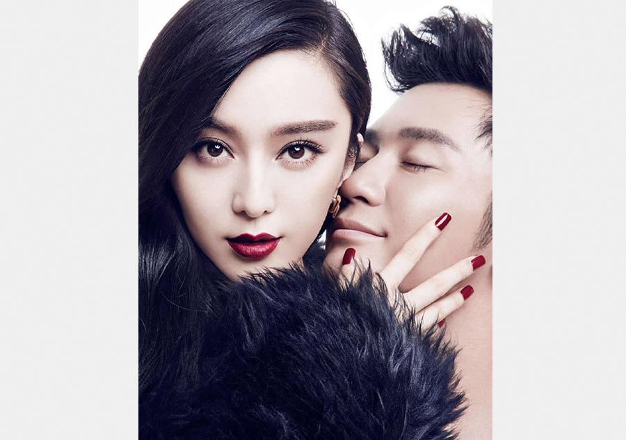 Fan Bingbing and Li Chen pose for photos