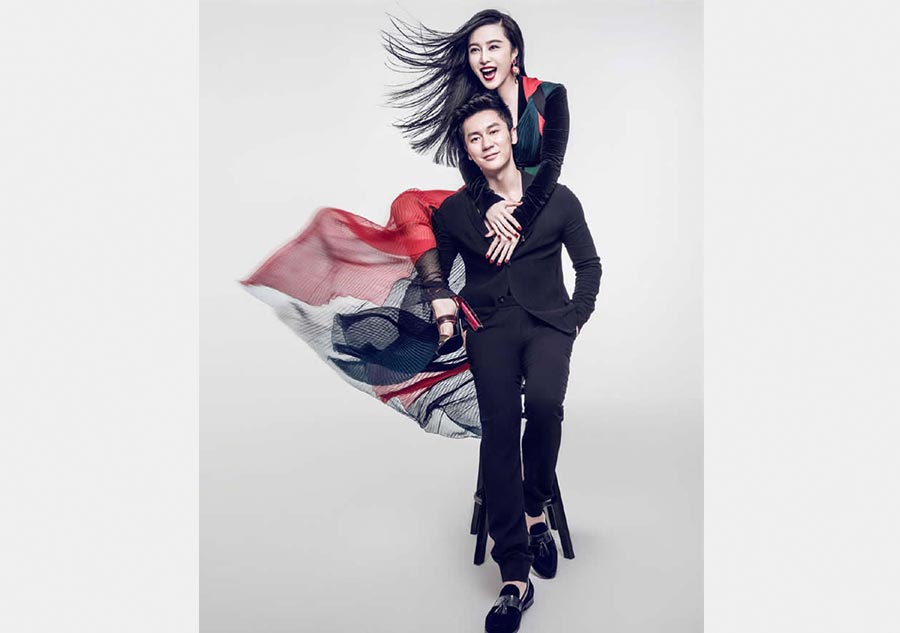Fan Bingbing and Li Chen pose for photos