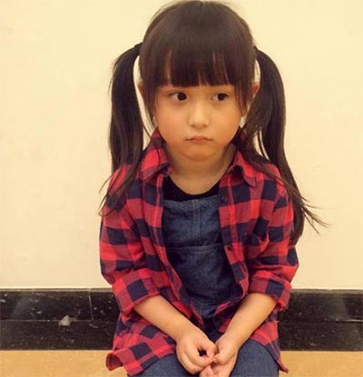Photos of young Miyue in <EM>The Legend of Miyue </EM>