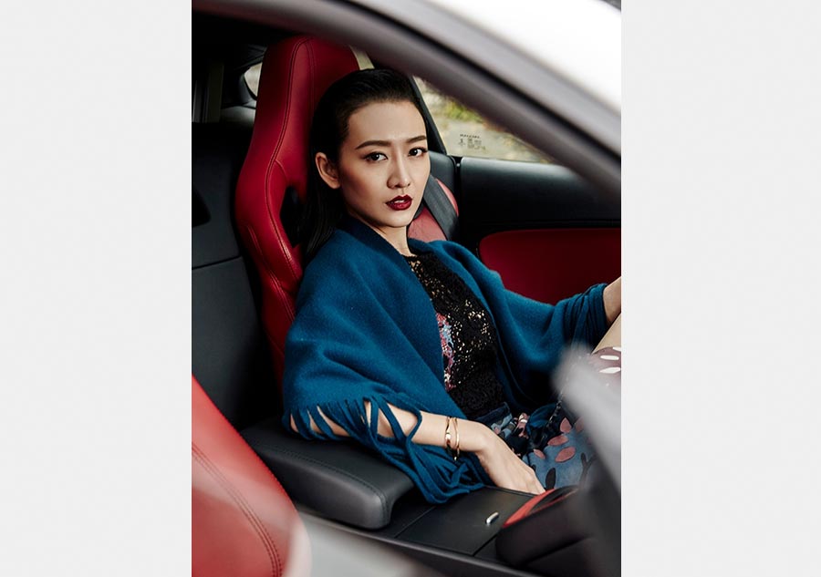 Actress Wang Ou poses for <EM>Car</EM> magazine