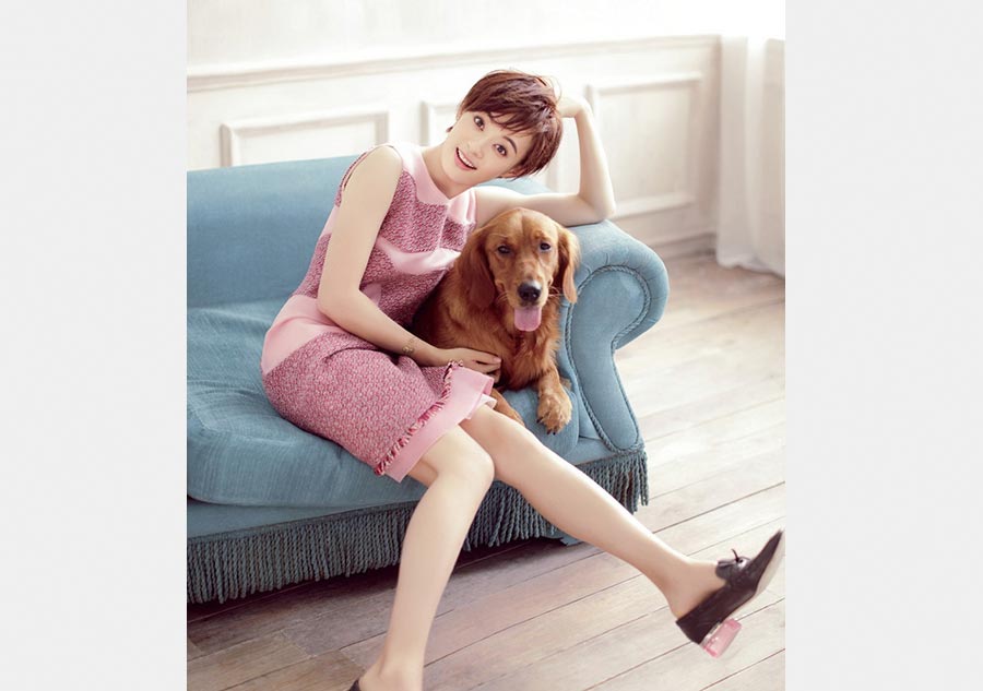 Sun Li poses with dogs for fashion magazine