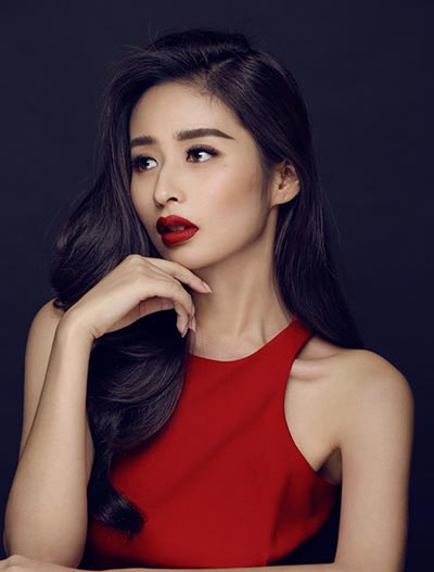 Actress Ying Er poses in red