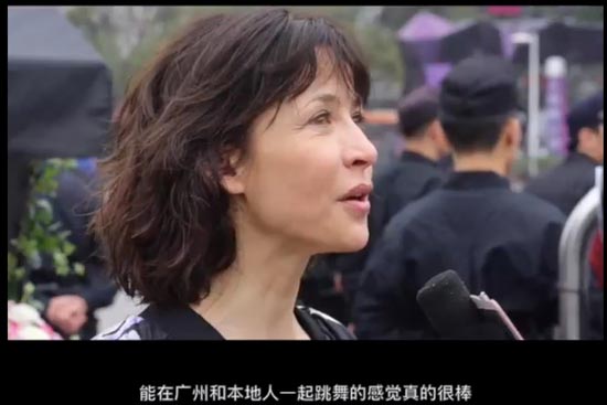 Sophie Marceau goes square dancing in Guangzhou