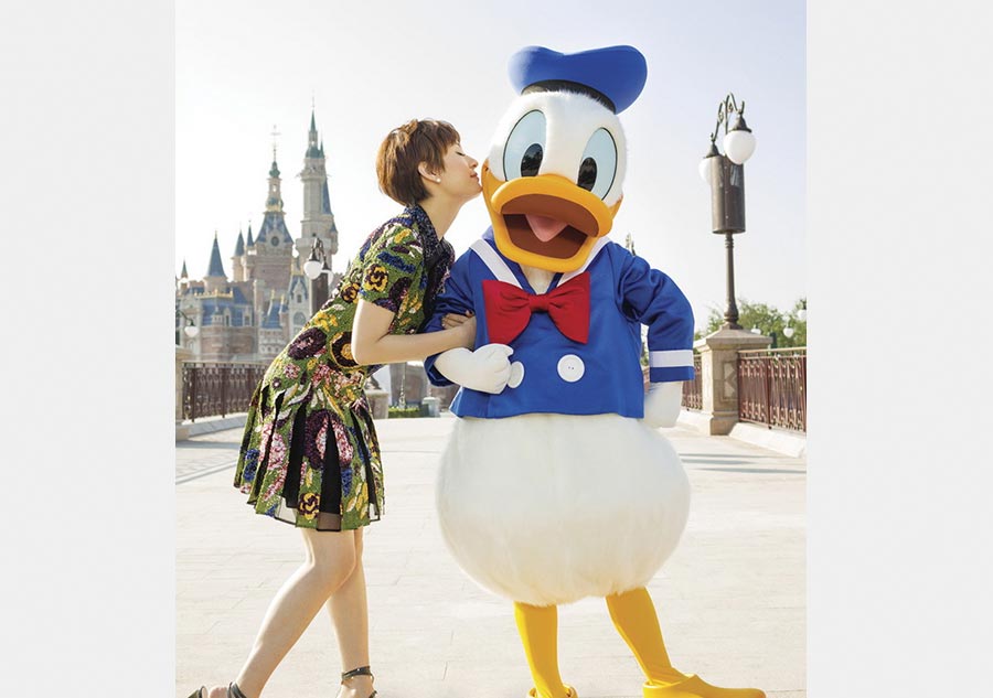 Ambassador for Disney Shanghai Sun Li poses in theme park