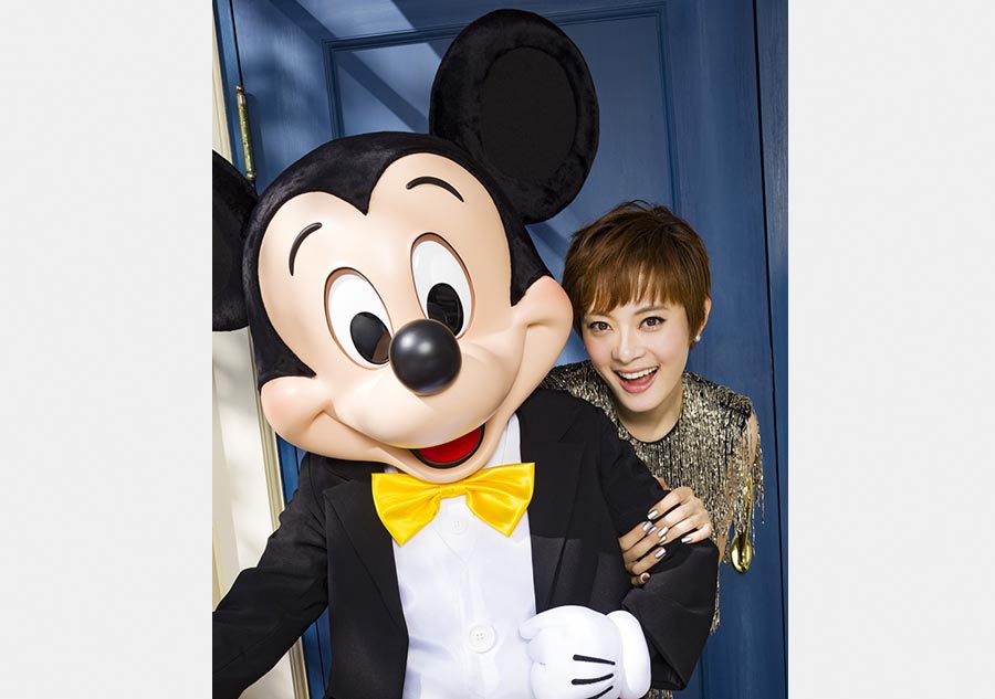 Ambassador for Disney Shanghai Sun Li poses in theme park