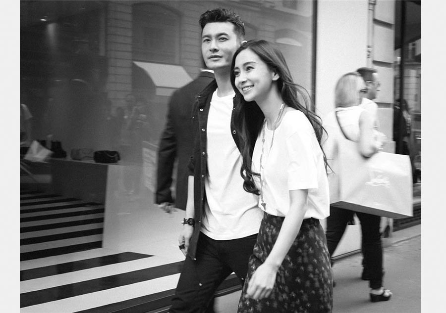 Huang Xiaoming and Angelababy spotted in Paris