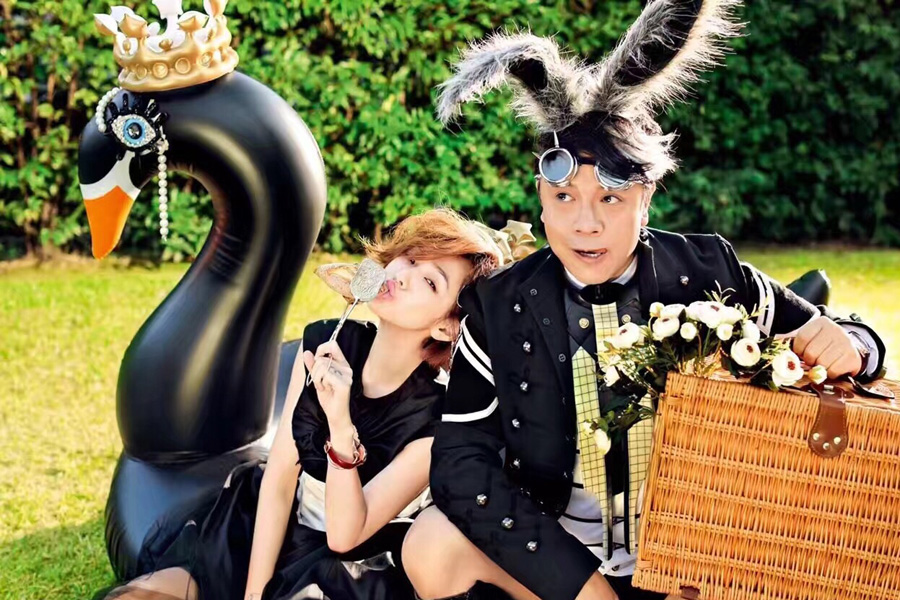 Taiwanese hosts Kevin Tsai and Dee Hsu pose for fashion magazine