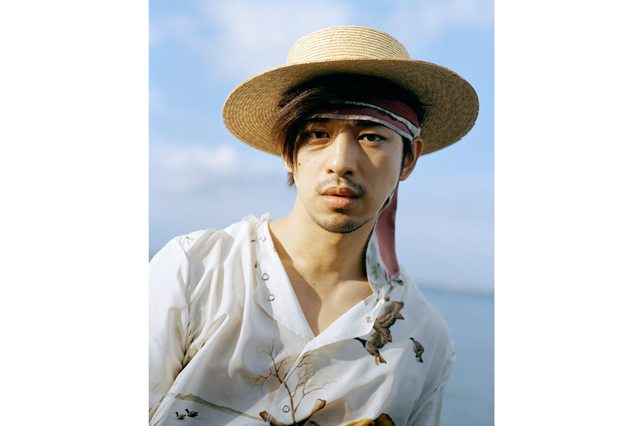Actor Chen Bolin poses for fashion magazine