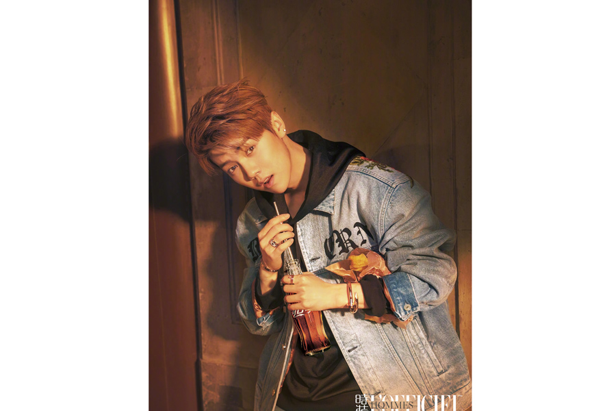 Actor Lu Han poses for fashion magazine