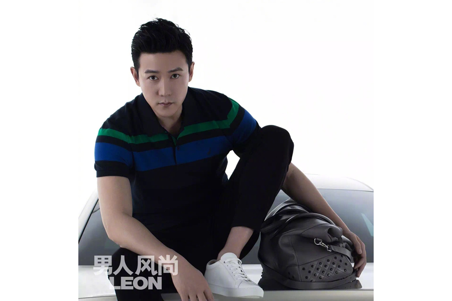 Actor Lu Yi poses for the fashion magazine