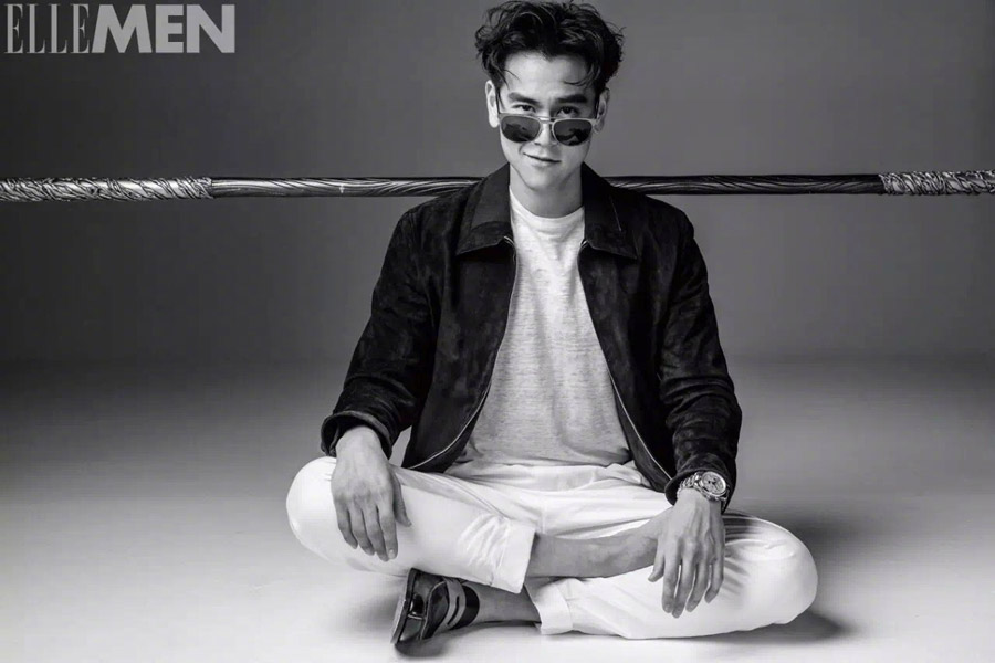 Actor Eddie Peng poses for fashion magazine