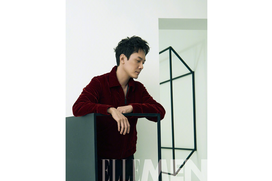 Actor Feng Shaofeng poses for fashion magazine