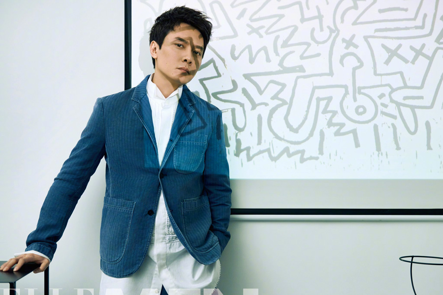 Actor Feng Shaofeng poses for fashion magazine