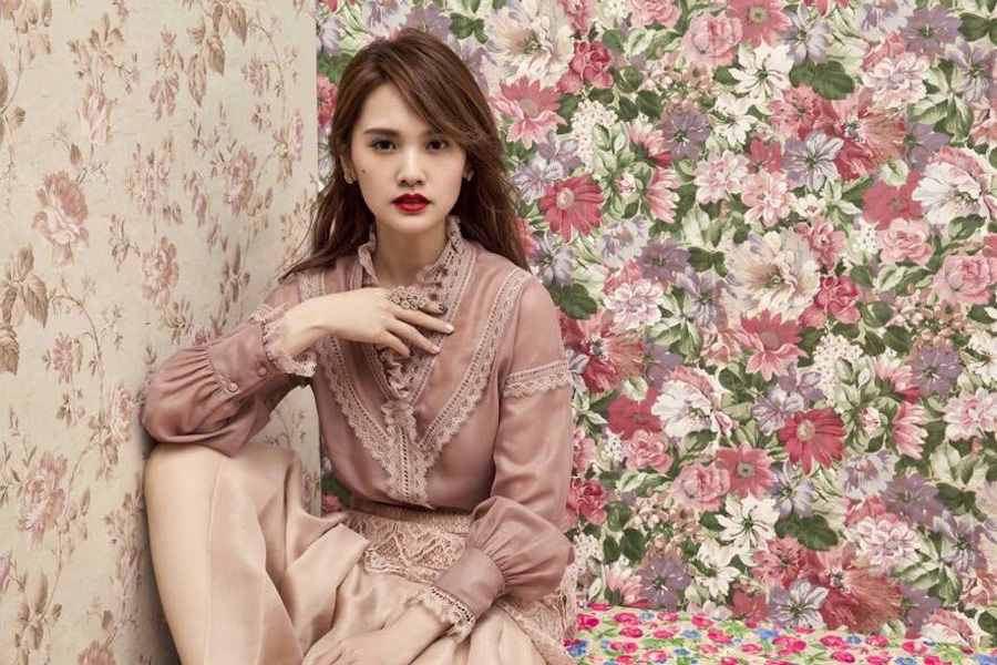 Actress-singer Rainie Yang poses for fashion magazine