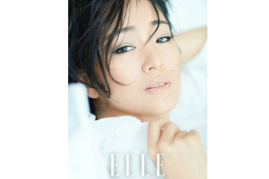 Chinese actress Gong Li poses for fashion magazine