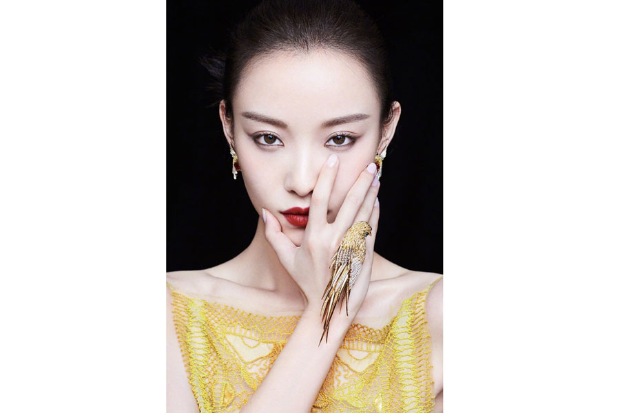 Chinese actress Ni Ni poses for fashion magazine