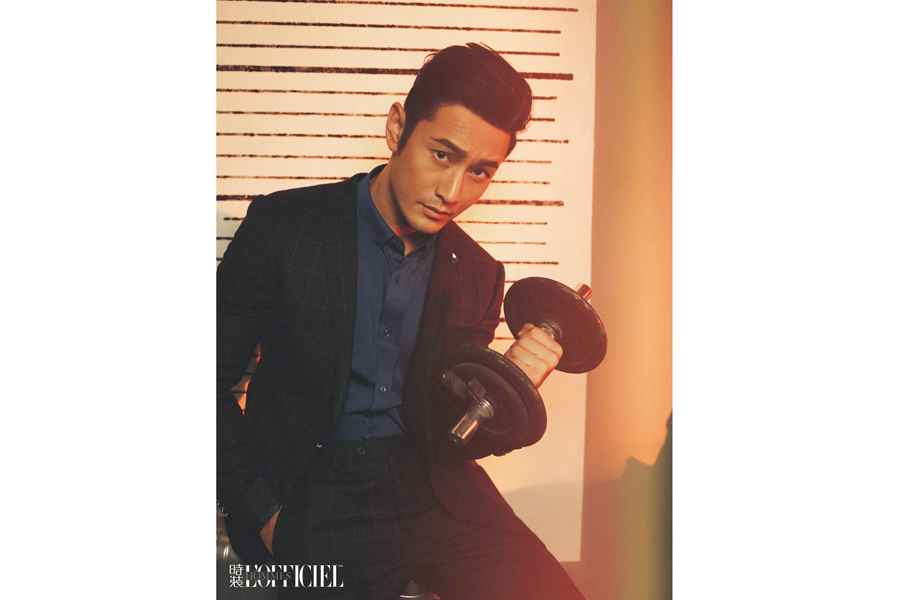 Actor-singer Huang Xiaoming poses for fashion magazine