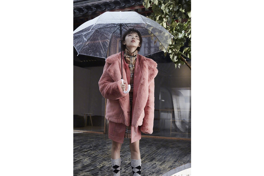 Actress Zhou Dongyu poses for fashion magazine