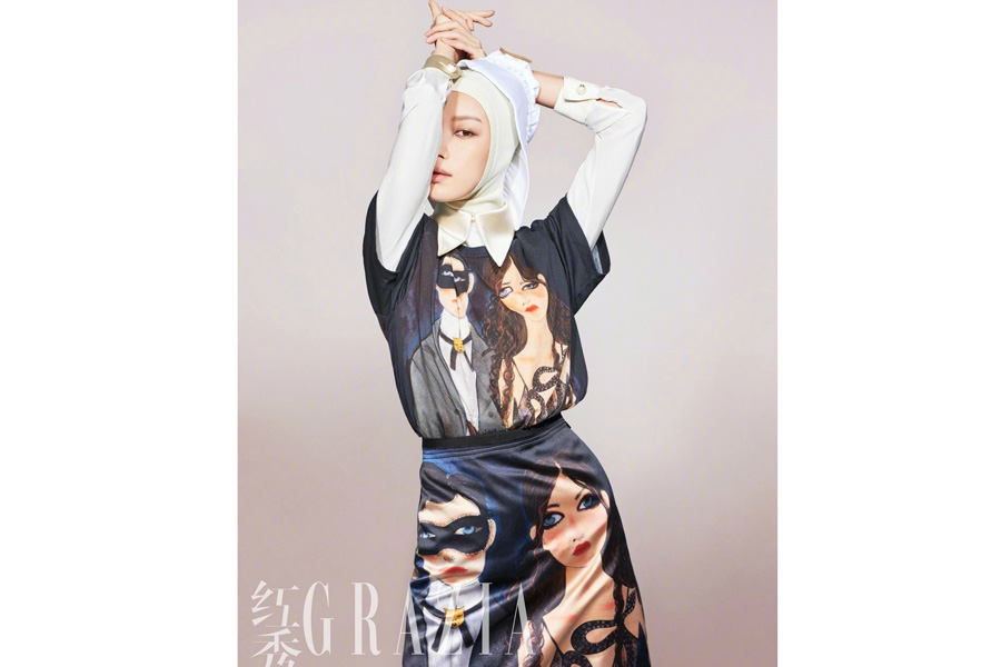 Actress Ni Ni poses for fashion magazine