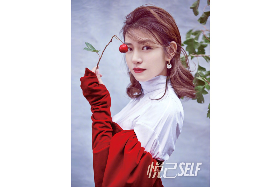 Actress Michelle Chen poses for fashion magazine