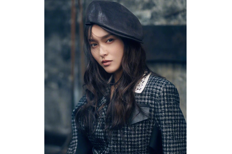 Actress Tang Yan poses for fashion magazine