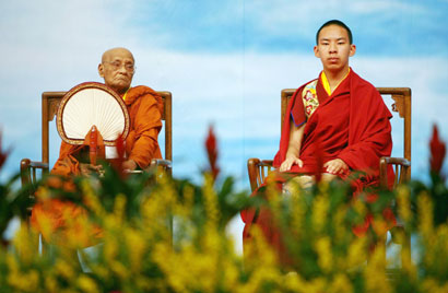 Gyaltsen Norbu (R), known as the Panchen Lama, and Grantha Visarada Rajakiya Pandita, supreme prelate of Sri Lanka, attend the opening ceremony of the World Buddhist Forum in Hangzhou, Zhejiang province in east China April 13, 2006.