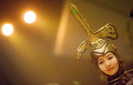 A woman from the Great Chinese State Circus performs during their show 'Yin Yang' in Burgos, northern Spain April 20, 2006. The Circus is more than 2,000 years old, with artists beginning studies at the age of six to become talented performers from 10 -18 years of age. The circus, featuring about 60 acrobats, is directed by gymnast Li Xining and is currently touring Spain. 