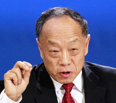 Chinese Foreign Minister Li Zhaoxing holds a news conference during the 10th National People's Congress in Beijing March 7, 2006.