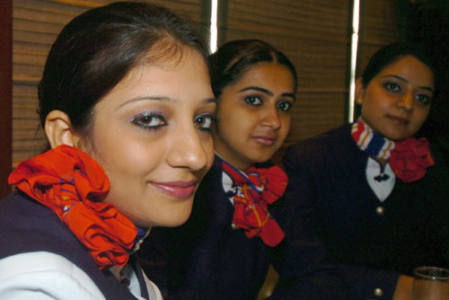 A China Eastern's air hostess of India poses during an interview on May 26, 2006. A group of Indian air hostesses will be hired by China Eastern from May 27, 2006 and 16 of them will serve on the Beijing - Shanghai - New Delhi flights from June 1st, 2006. [Xinhua] 