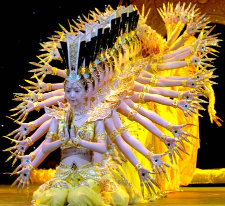 Artists from the China Art Troupe of the Disabled Persons perform an improved version of The Thousand-Hand Bodhisattva in Beijing June 3, 2006. Their new show, My Dream, includes episodes as The Butterfly Lovers and The Thousand-Hand Bodhisattva. In May, they performed in Canada and the United States and were well received. [newsphoto]