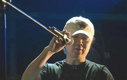 Chinese rock icon Cui Jian during rehearsals for a concert to mark the 20th anniversary of rock music in China held at an indoor stadium in Shenyang, north China's Liaoning province, June 16, 2006. Cui Jian introduced rock music to China with his song 'I Own Nothing' in 1986. [AP Photo]