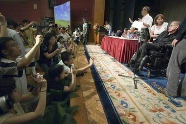 Stephen Hawking, a wheelchair-bound celebrity cosmologist who has near superstar status in China, attends a conference on string theory held in Beijing, China, Wednesday, June 21, 2006. Hawking charmed and provoked a group of Chinese students, telling them he liked Chinese women while warning that global warming might turn the Earth into a fiery planet. An occasional visitor to China, Hawking was in Beijing to attend a conference on string theory, an area of physics that attempts to explain and model the universe. (AP Photo