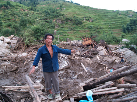 flood-devastated village at Longhui County, Central China's Hunan Province