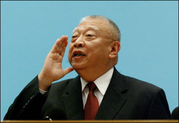 Hong Kong Chief Executive Tung chee-hwa gestures during a press conference at the Central Government Offices (CGO) building in Hong Kong, 10 March 2005 announcing his resignation. Hong Kong's leader Tung Chee-hwa submitted his resignation March 10, citing health reasons for stepping down early. [AFP]