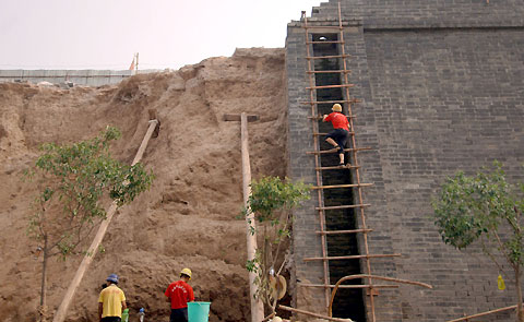 Renovators of the ancient city walls in Xi'an are in for a busy time after a 30-metre section they were working on partly collapsed on Tuesday.