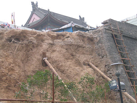Renovators of the ancient city walls in Xi'an are in for a busy time after a 30-metre section they were working on partly collapsed on Tuesday.