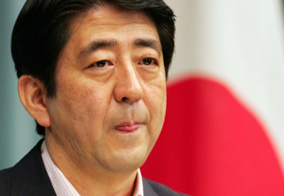 Japanese Chief Cabinet Secretary Shinzo Abe listens to questions during a news conference at Prime Minister Junichiro Koizumi's official residence in Tokyo August 4, 2006. Abe, front-runner to become Japan's next prime minister, made a pilgrimage earlier this year to a Tokyo war shrine that is seen by critics as a symbol of the country's past militarism, media reports said on Friday. 