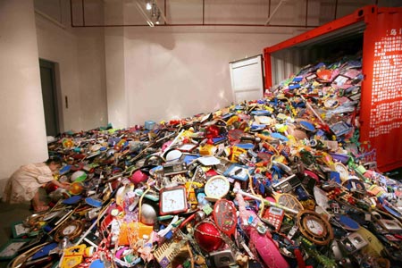 A girl plays with an art installation by Chinese artist Liu Jianhua during the opening of the 6th Shanghai Biennial in Shanghai September 5, 2006. 