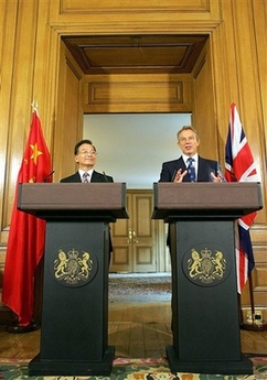 British Prime Minister Tony Blair, right, holds a joint press conference with his Chinese counterpart Wen Jiabao at No.10 Downing Street in central London, Wednesday Sept. 13, 2006. The two leaders met for potentially difficult talks that will focus on Iran and North Korea's nuclear programs while supporters and protesters lined the streets outside Blair's offices. The Middle East and the need to secure energy for the world's growing economies will also be discussed, but it was unclear how much Blair and Wen would address the thorny issues of human rights and new rules on foreign news agencies in China. (AP