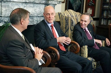 Treasury Secretary Henry Paulson, center, meets with Sens. Lindsey Graham, R-S.C., left, and Charles Schumer, D-N.Y., right,, in Graham's office on Capitol Hill in Washington, Tuesday, Sept. 26, 2006. Paulson briefed the Senators on his recent trip to China.